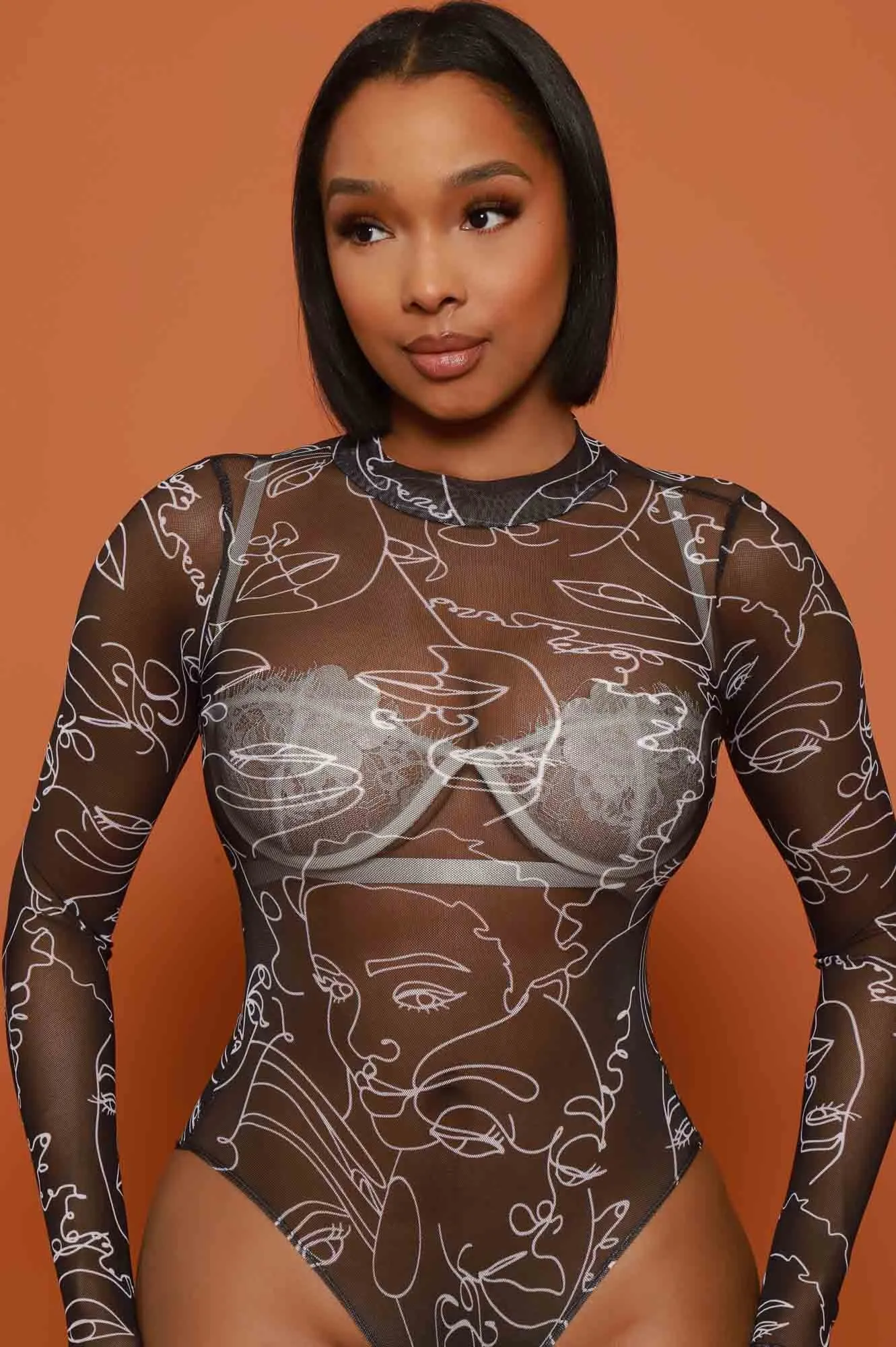 Share My Life Graphic Print Mesh Bodysuit - Black sold by Swankaposh