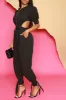 Who Knew Puff Sleeve Open Back Jumpsuit - Black sold by Swankaposh