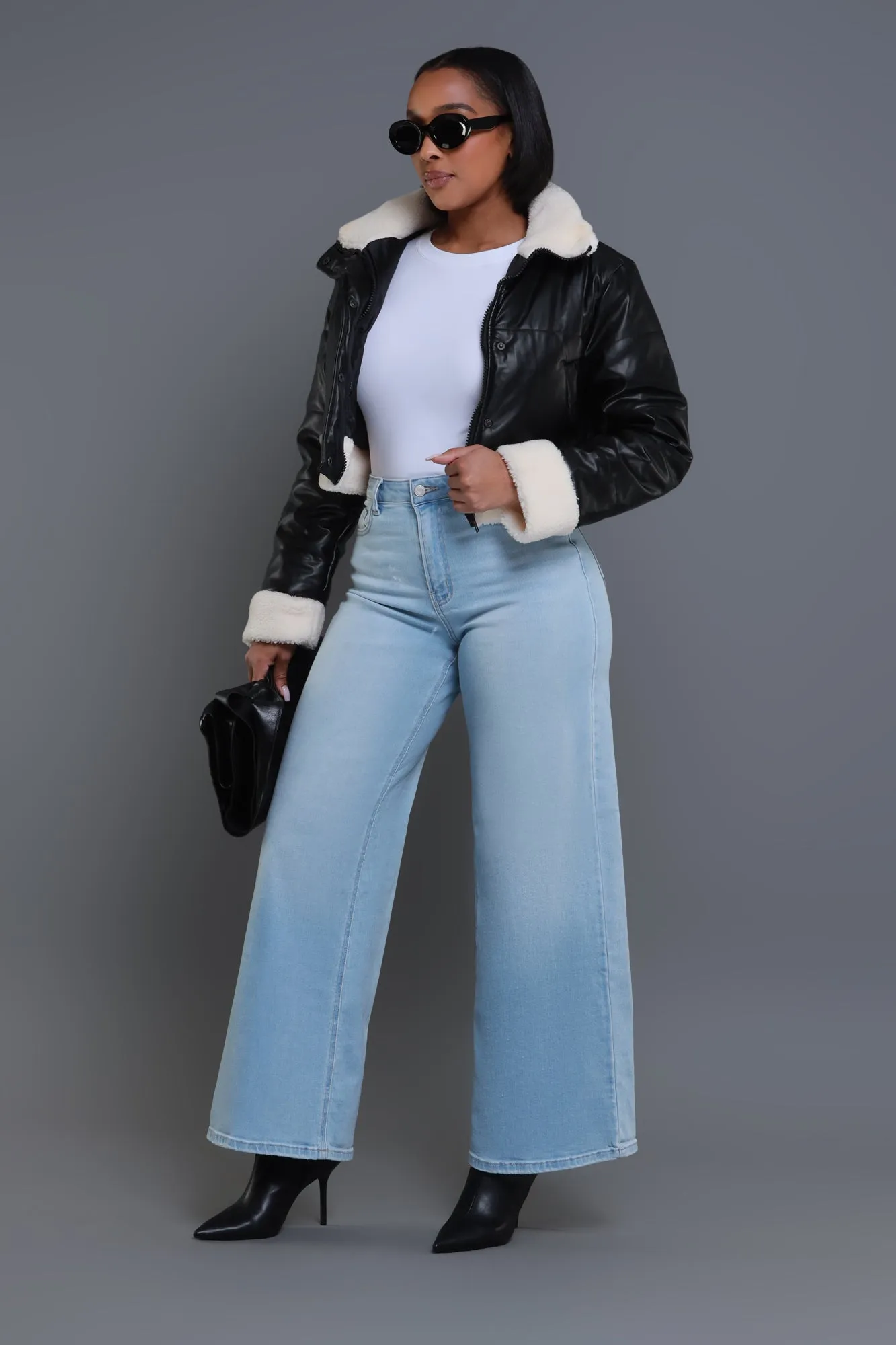 Bite Your Tongue High Rise Wide Leg Jeans - Light Wash sold by Swankaposh