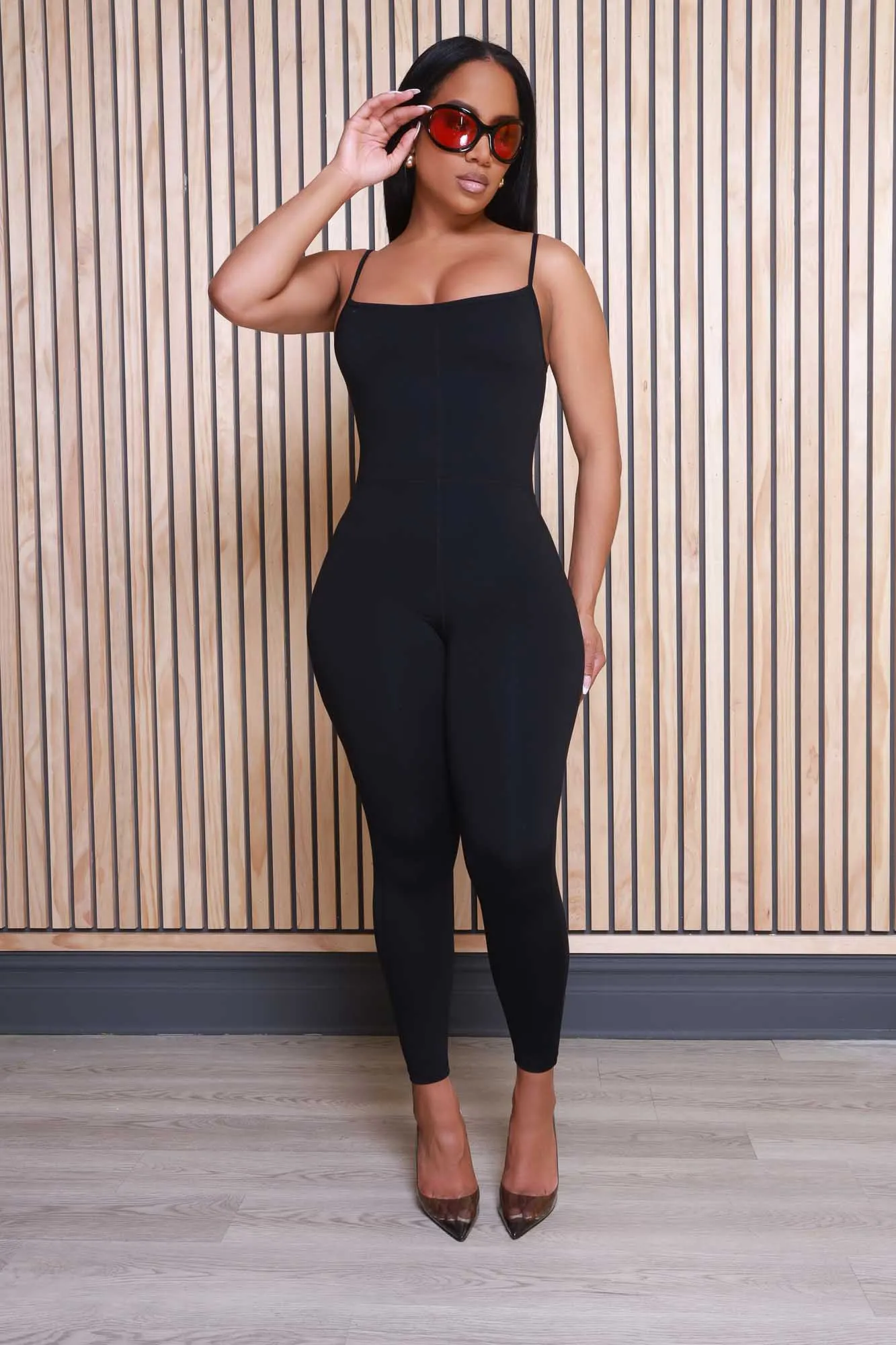 Rumor Has It Sleeveless Jumpsuit - Black sold by Swankaposh