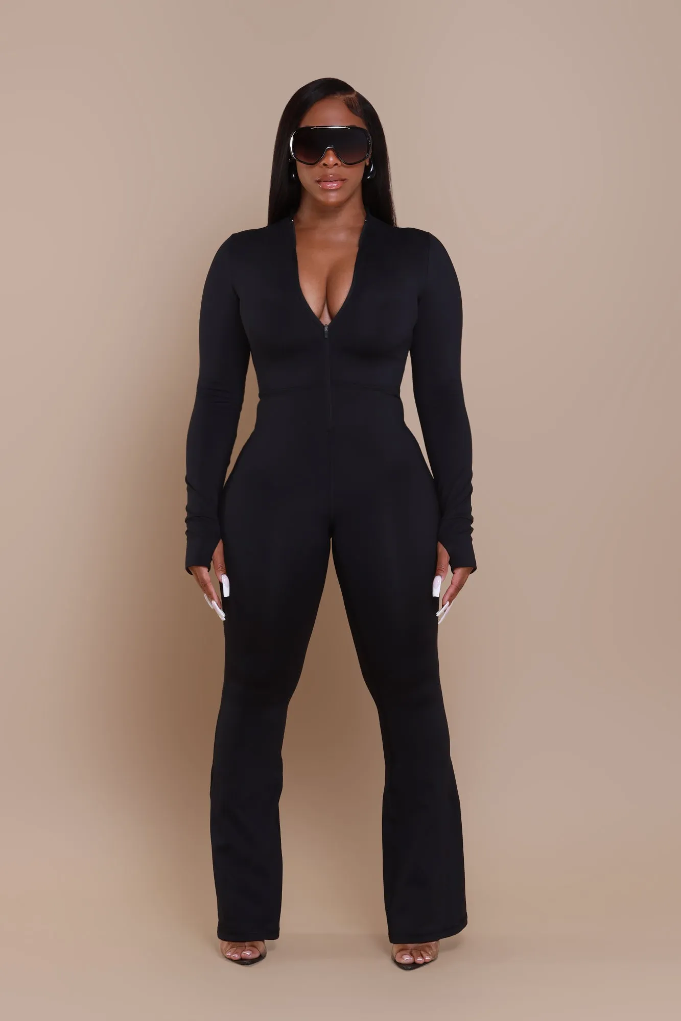 Code Black NUW Zip Up Flare Jumpsuit - Black sold by Swankaposh