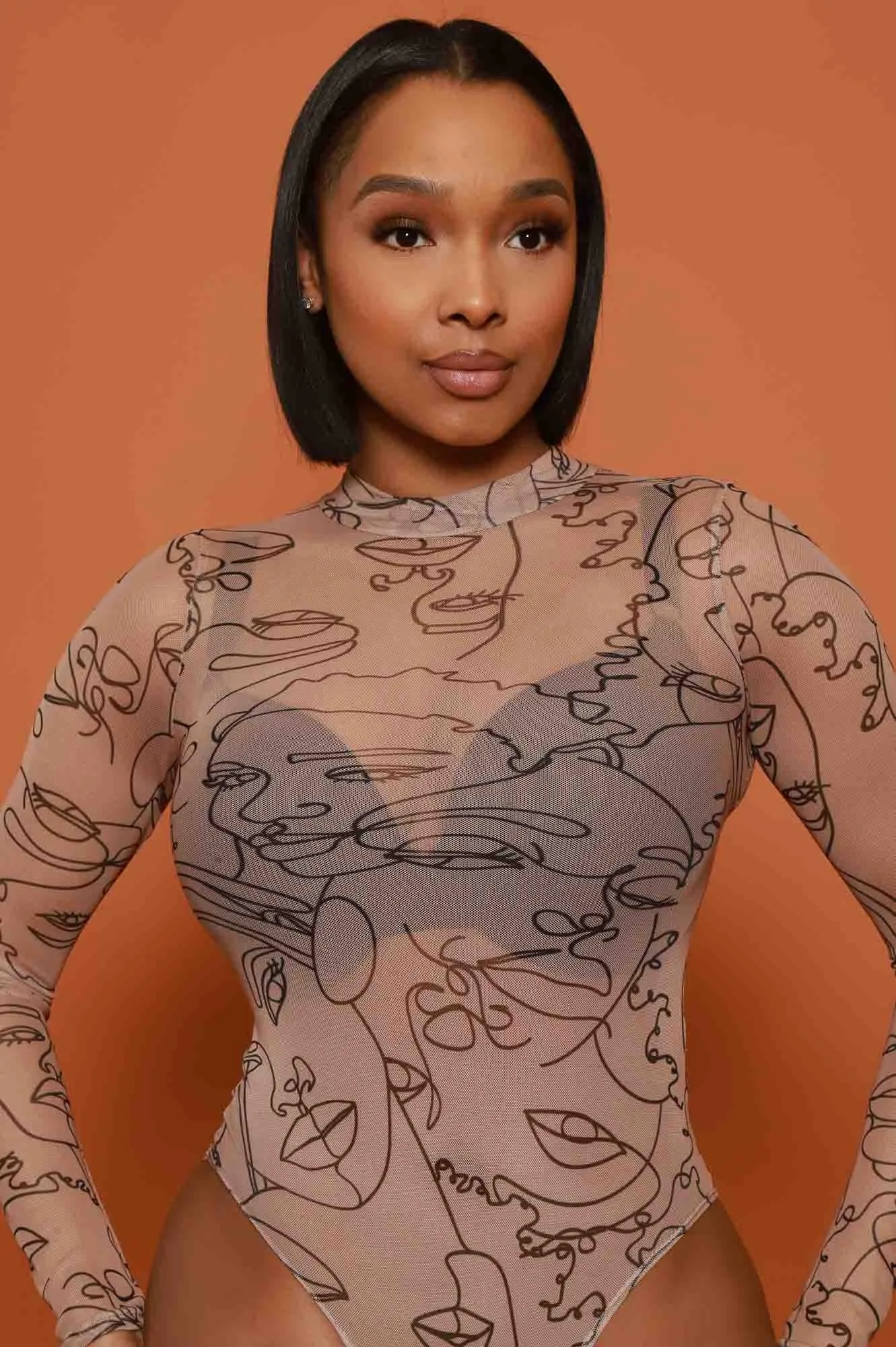 Share My Life Graphic Print Mesh Bodysuit - Taupe sold by Swankaposh