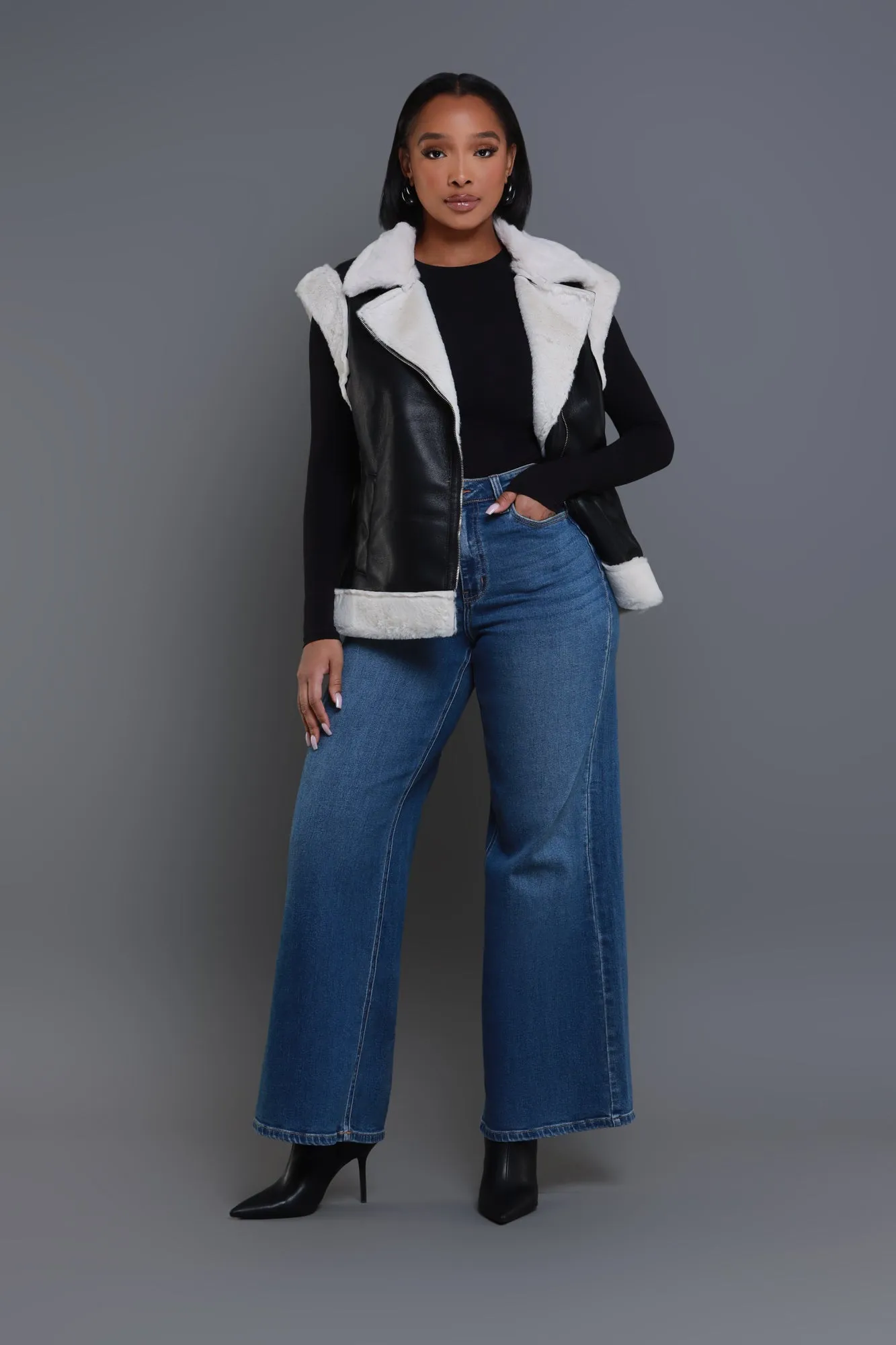 Be Quiet Faux Leather Sherpa Vest - Black/Cream sold by Swankaposh