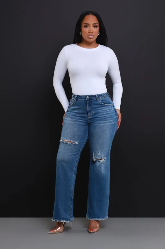 This Real High Rise Distressed Wide Leg Jeans - Dark Wash sold by Swankaposh
