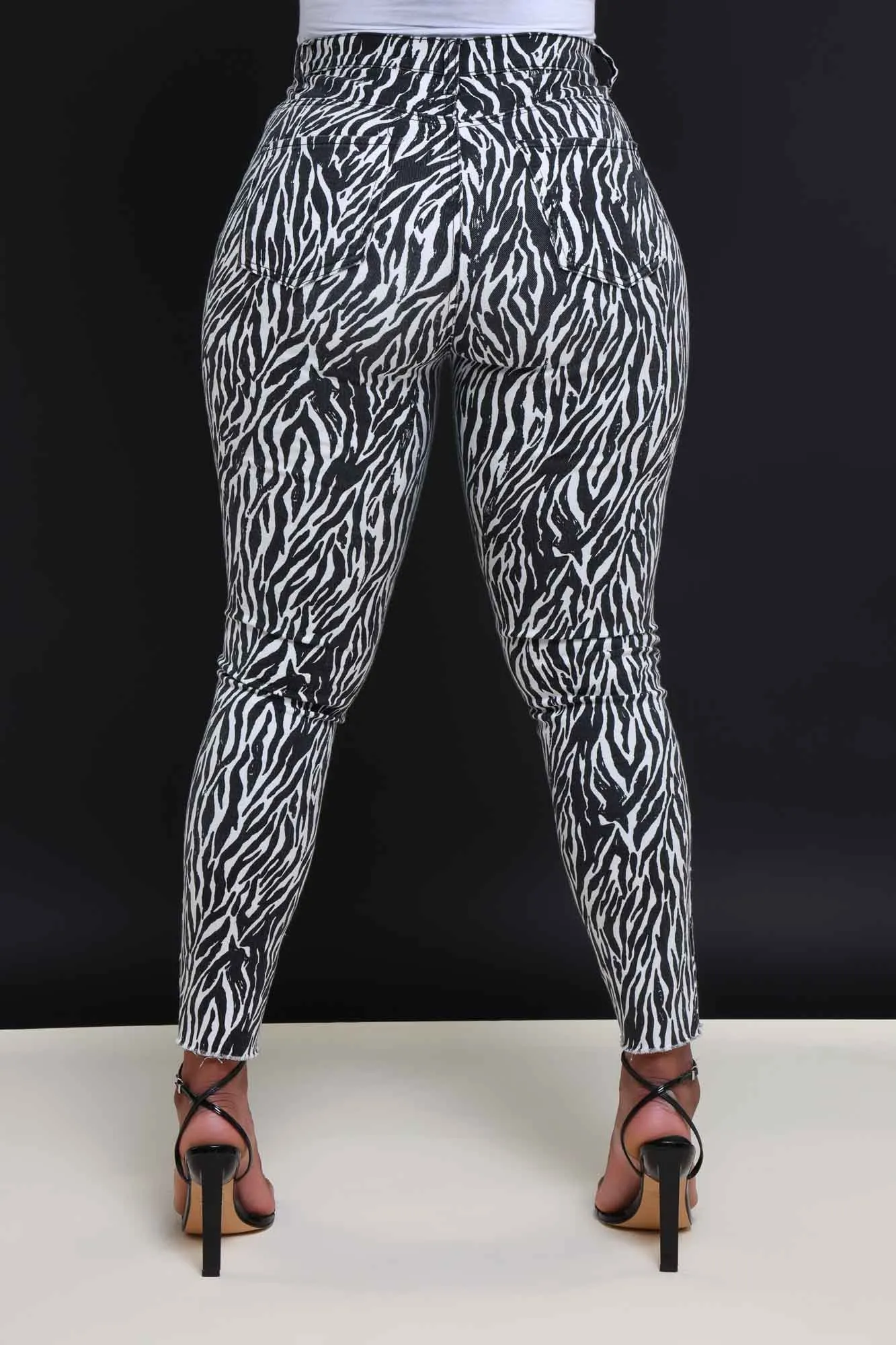 On Location Hourglass High Rise Animal Print Skinny Jeans - Black/White sold by Swankaposh product image thumbnail 3