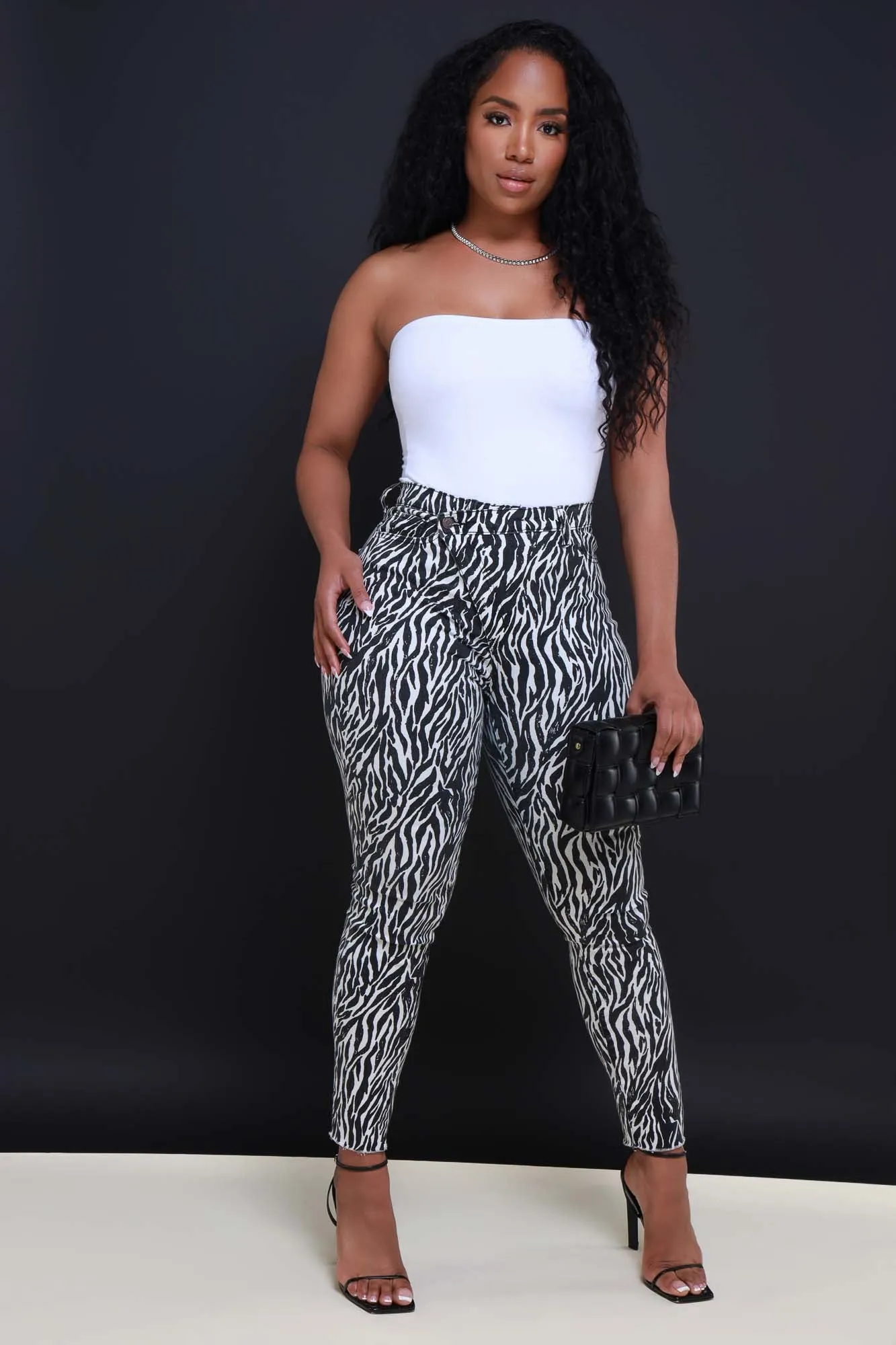 On Location Hourglass High Rise Animal Print Skinny Jeans - Black/White sold by Swankaposh