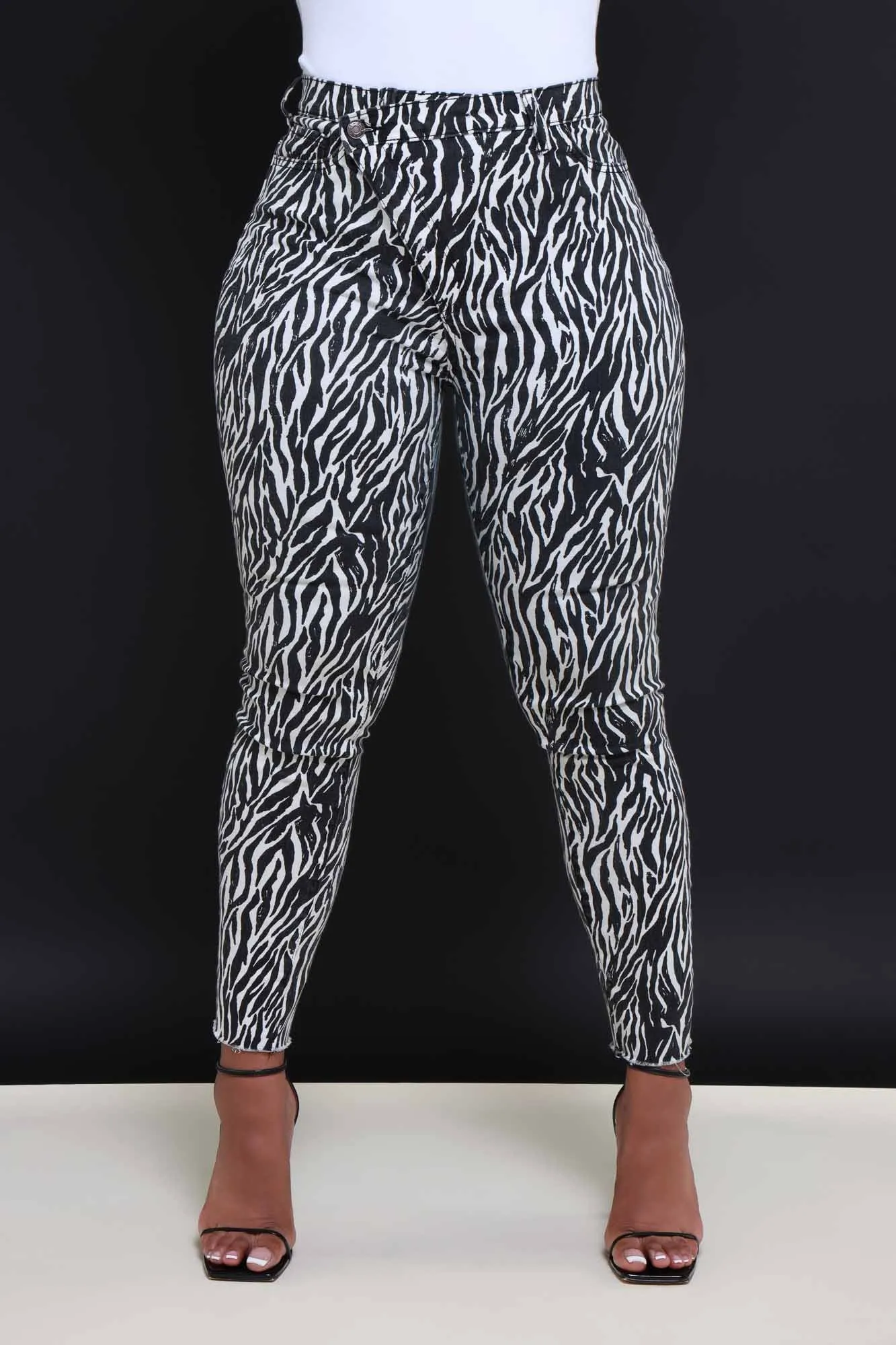 On Location Hourglass High Rise Animal Print Skinny Jeans - Black/White sold by Swankaposh product image thumbnail 4