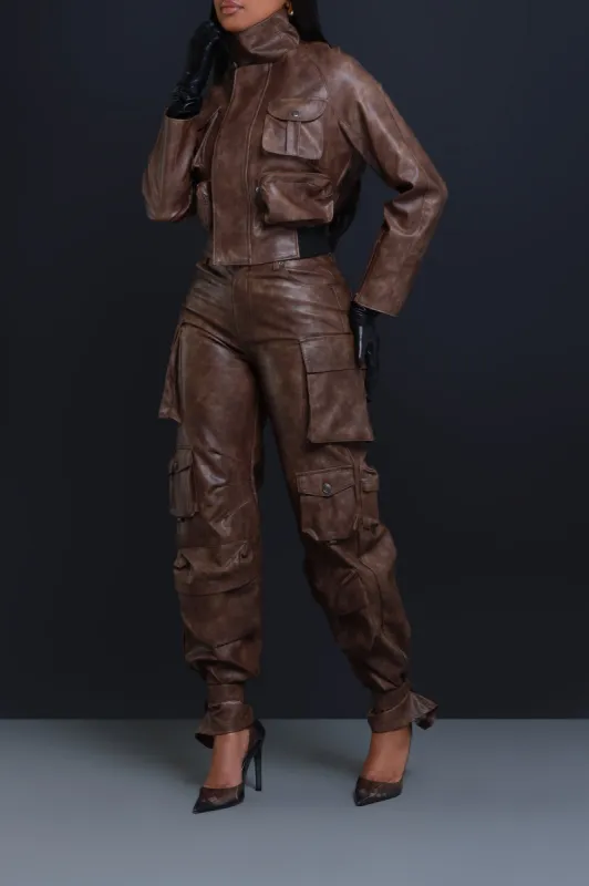 What We Do Vintage Faux Leather Cargo Pants - Brown sold by Swankaposh