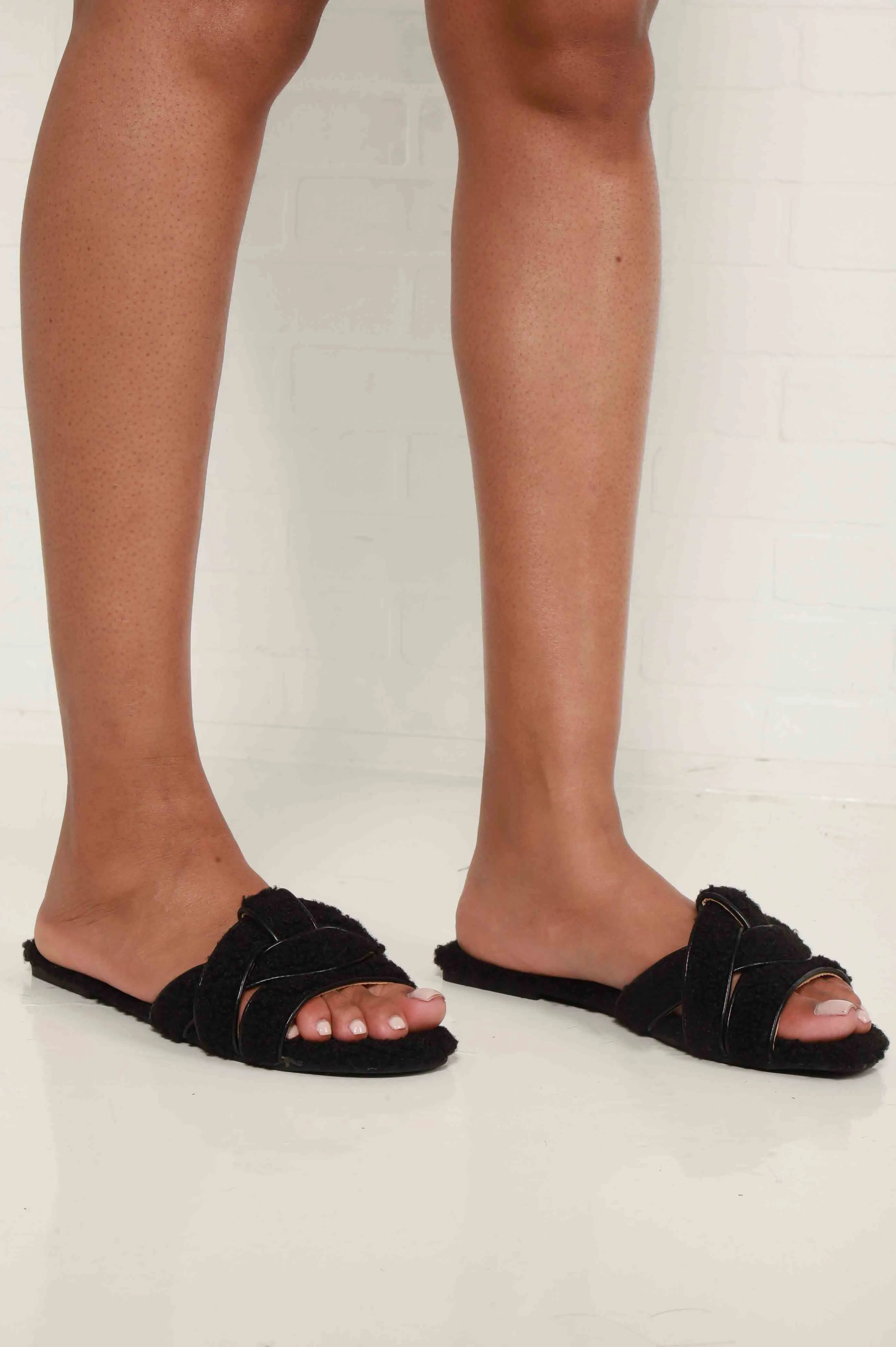 Feeling Fine Faux Sherpa Strappy Slides - Black sold by Swankaposh