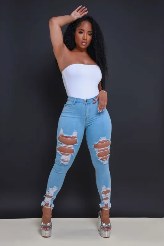 Witness Distressed High Rise Jeans - Light Wash sold by Swankaposh