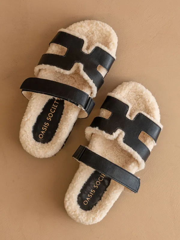 The Alpine | Black Faux Shearling Sandals sold by Oasis Society