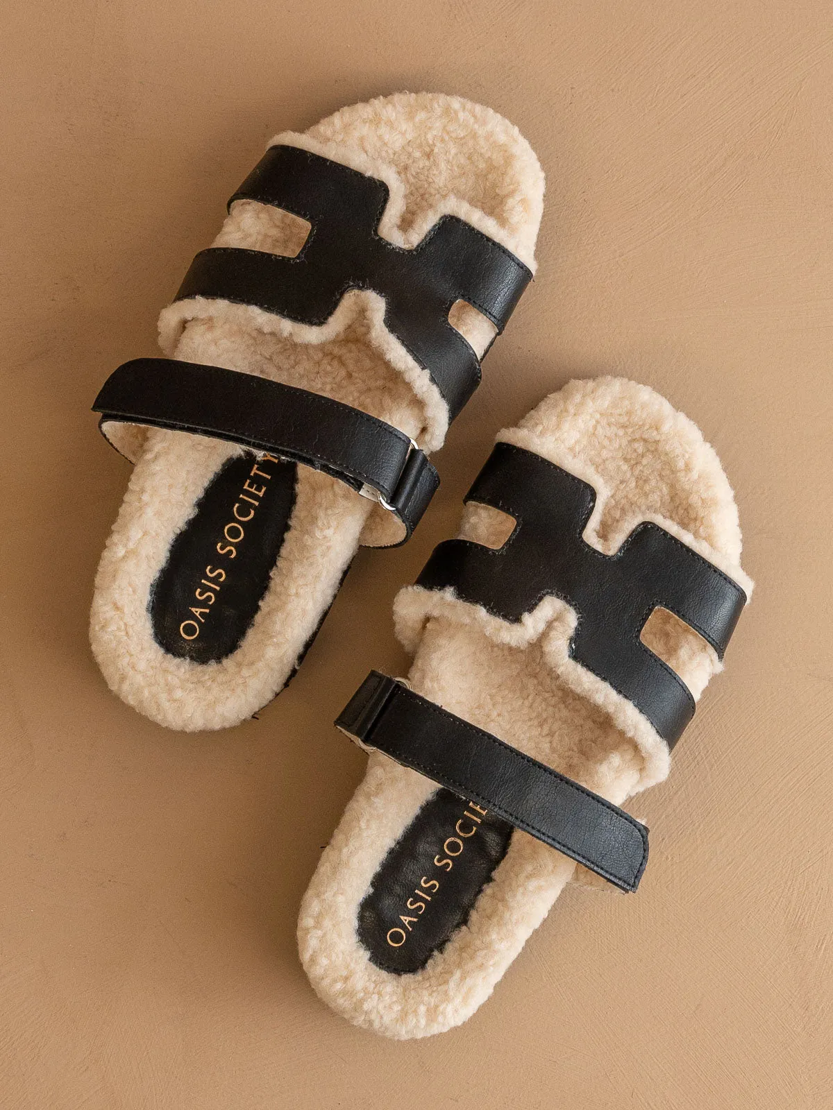 The Alpine | Black Faux Shearling Sandals sold by Oasis Society