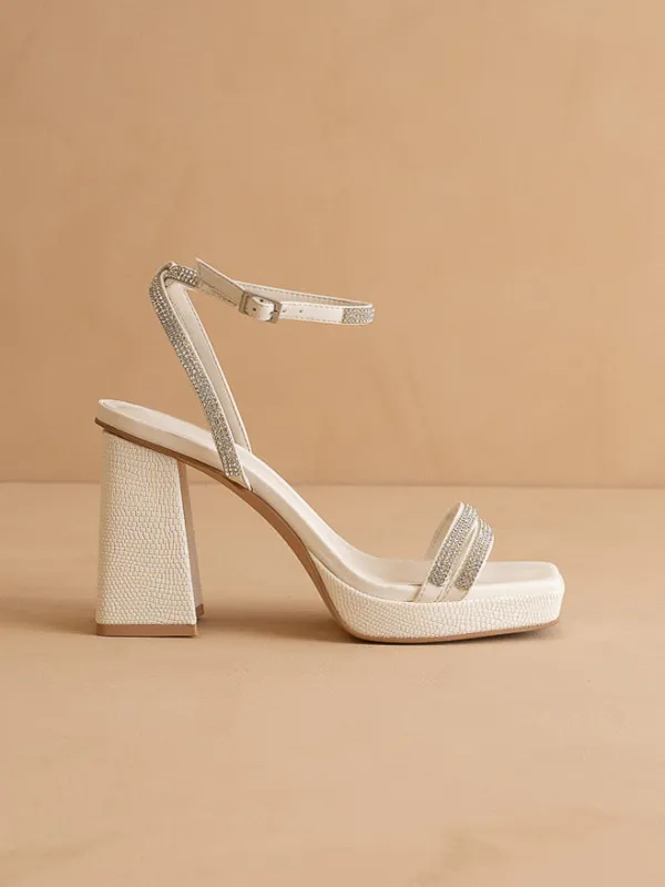 The Suva | White Rhinestone and reptile print strappy block heel sold by Oasis Society