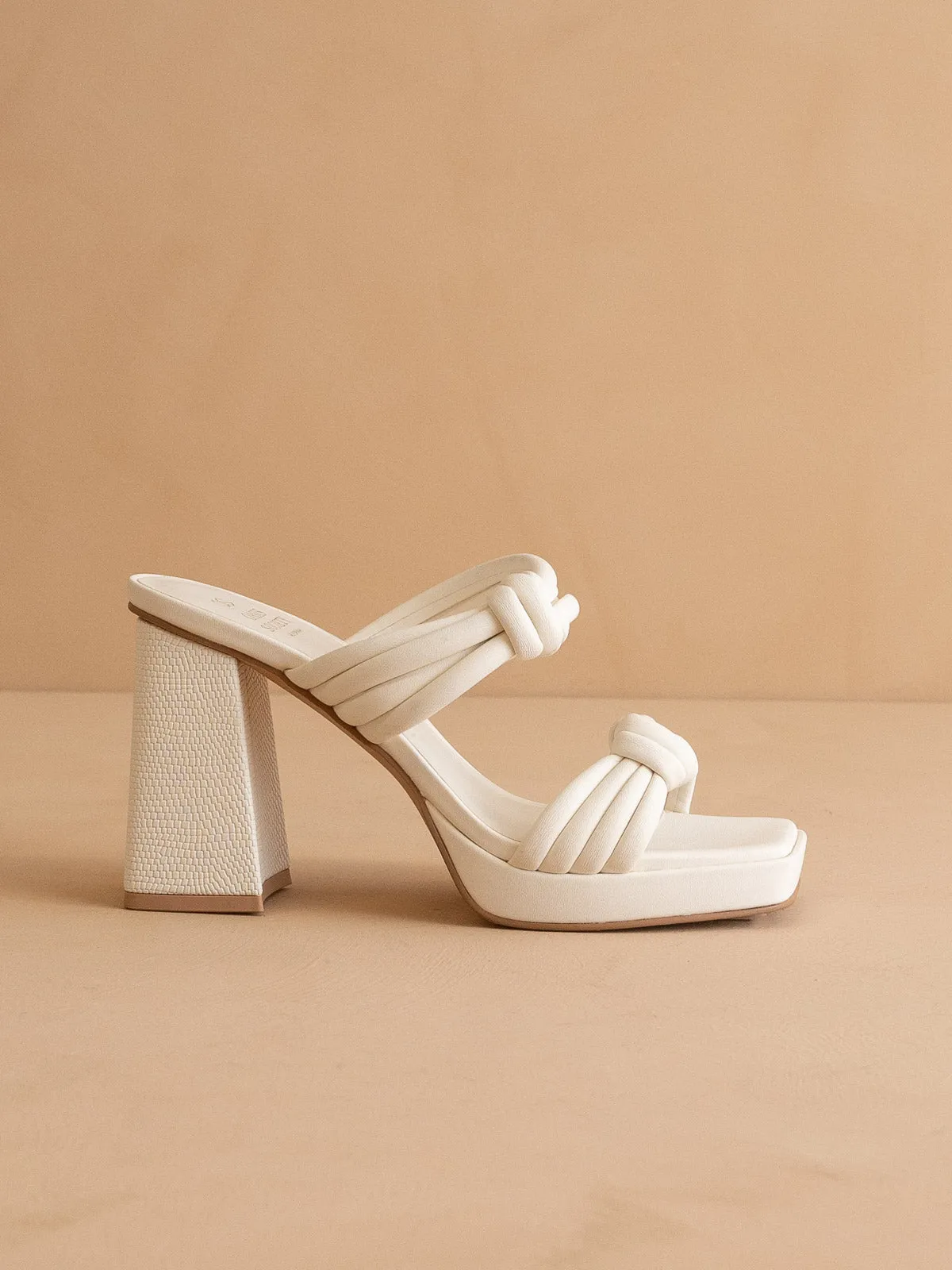The Faith | White Knotted band platform snake-print block heel sold by Oasis Society