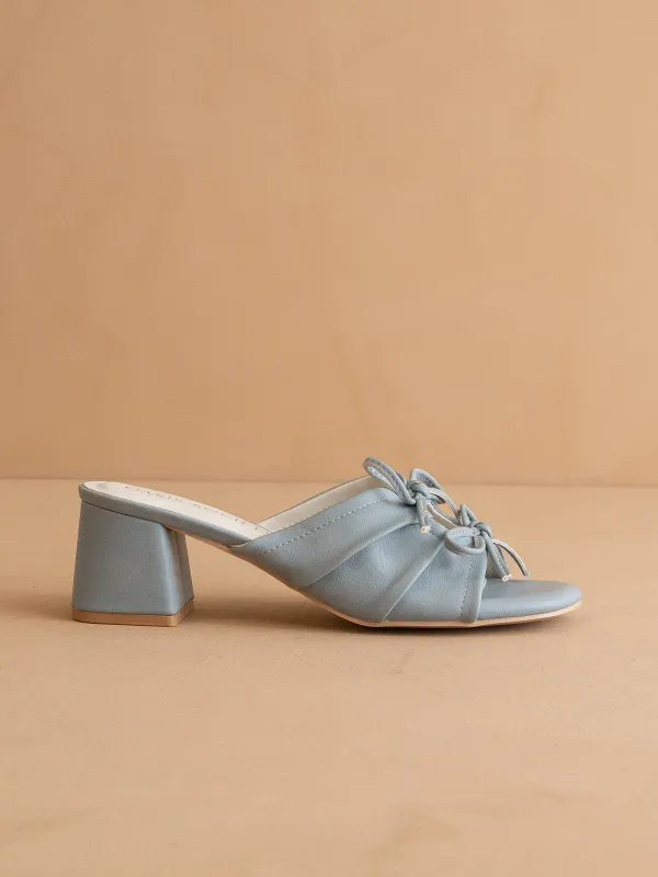 The Emerald | Blue Double Bow Peep Hole Sandal sold by Oasis Society