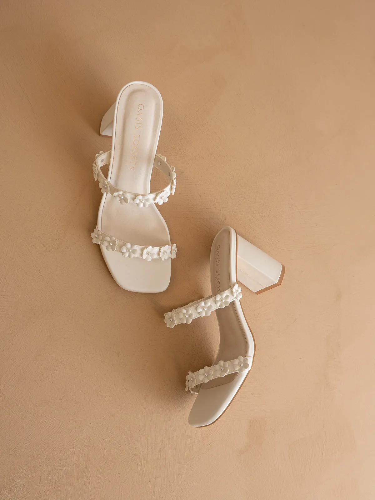 The Feliza | White Floral Raffia Block Heel Bridal Sandal sold by Oasis Society