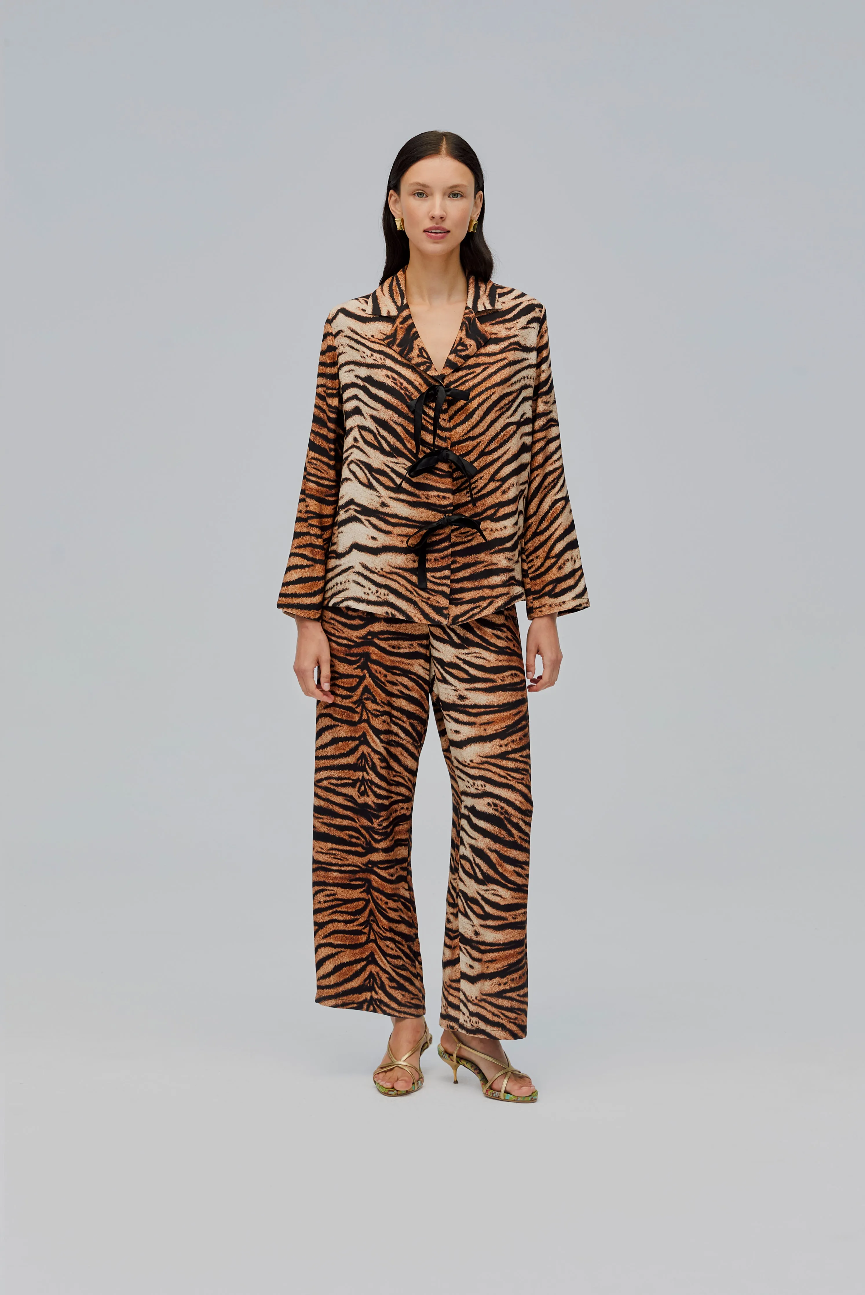 The Bow Pajama Set in Tiger sold by Sleeper