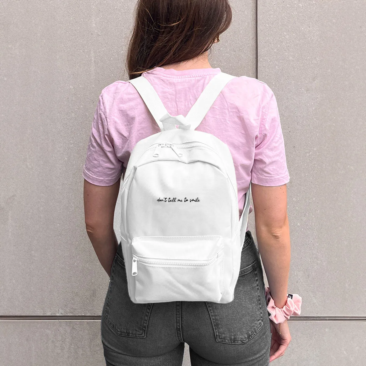 Don't Tell Me To Smile Embroidered Mini Backpack sold by The Spark Company product image thumbnail 2