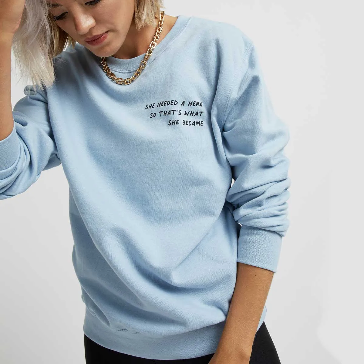 She Needed A Hero So That's What She Became Sweatshirt sold by The Spark Company product image thumbnail 2