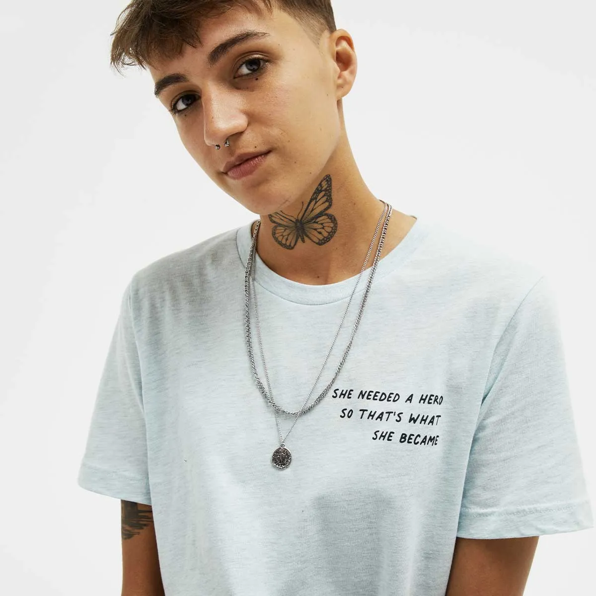 She Needed A Hero So That's What She Became T-Shirt sold by The Spark Company product image thumbnail 2