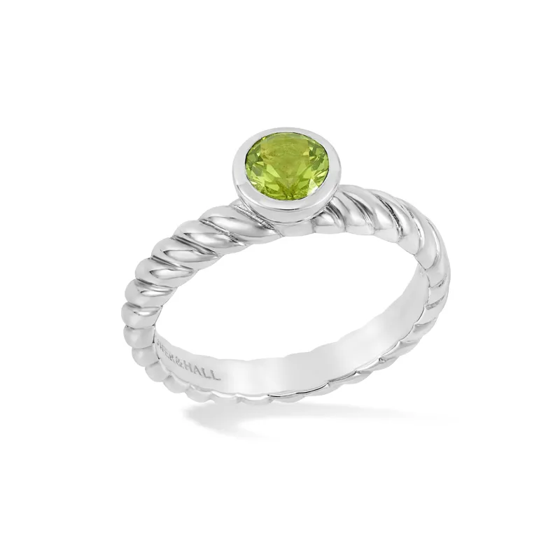 5mm Peridot Twist Twinkle Ring sold by Dower & Hall