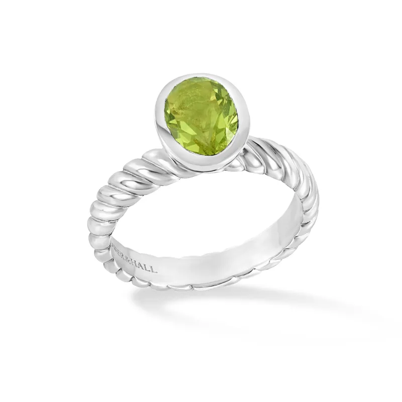 Oval Peridot Twist Twinkle Ring sold by Dower & Hall