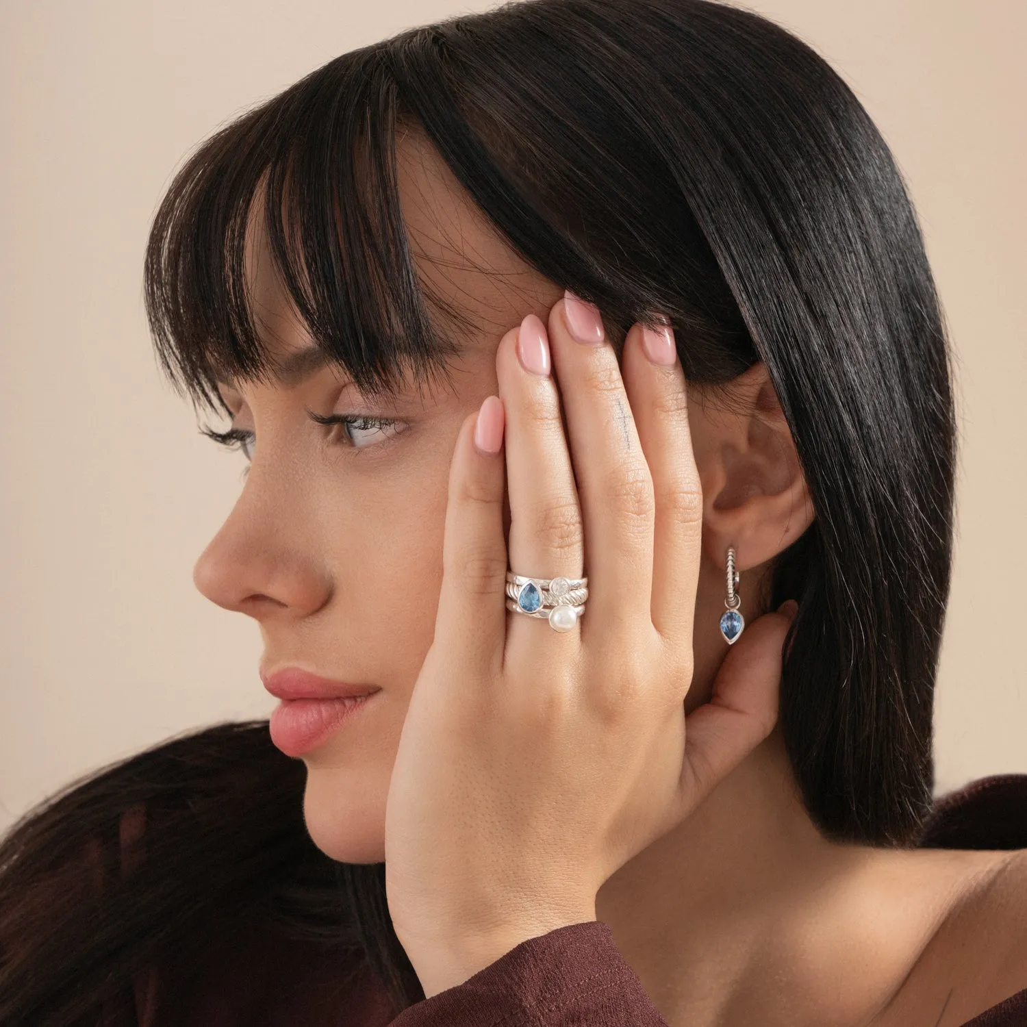White Topaz Pear Twist Twinkle Ring sold by Dower & Hall product image thumbnail 3