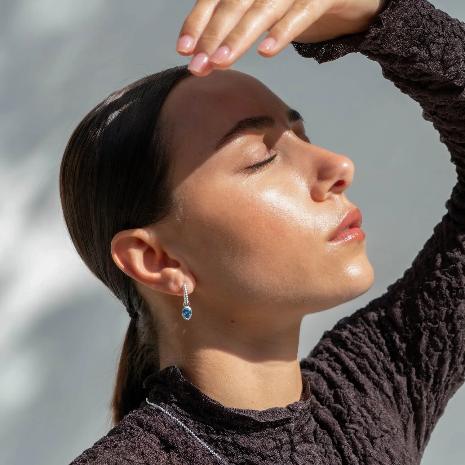 Blue Topaz Twist Huggie Charm Hoops sold by Dower & Hall product image thumbnail 2