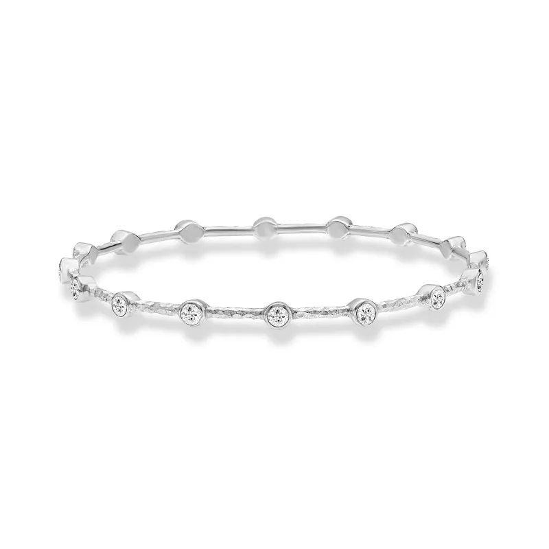 Round White Topaz Array Bangle sold by Dower & Hall