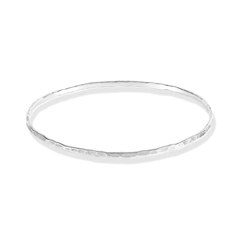2mm Hammered Nomad Bangle sold by Dower & Hall