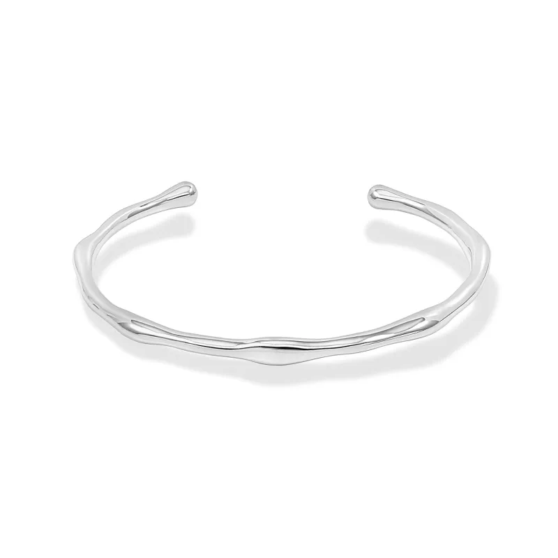 Waterfall Torque Bangle sold by Dower & Hall
