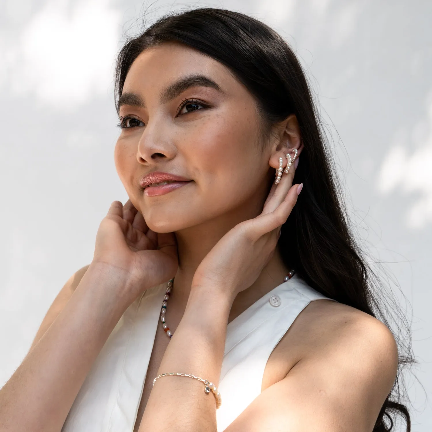 Small Timeless Pearl Huggie Hoops sold by Dower & Hall product image thumbnail 2