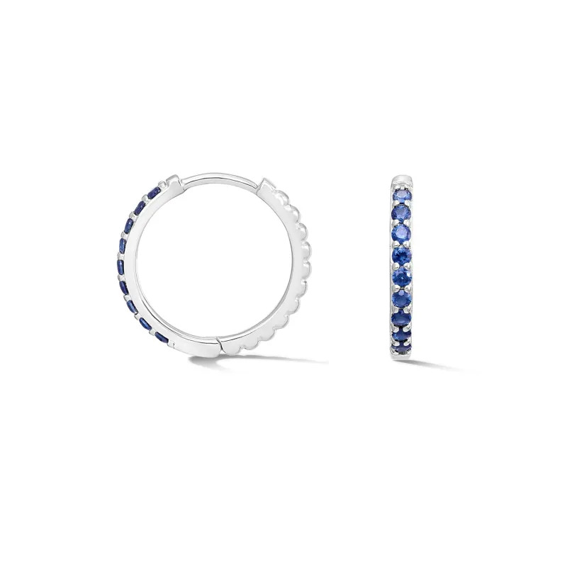 Blue Sapphire Lumiere Huggie Hoops made by Dower & Hall