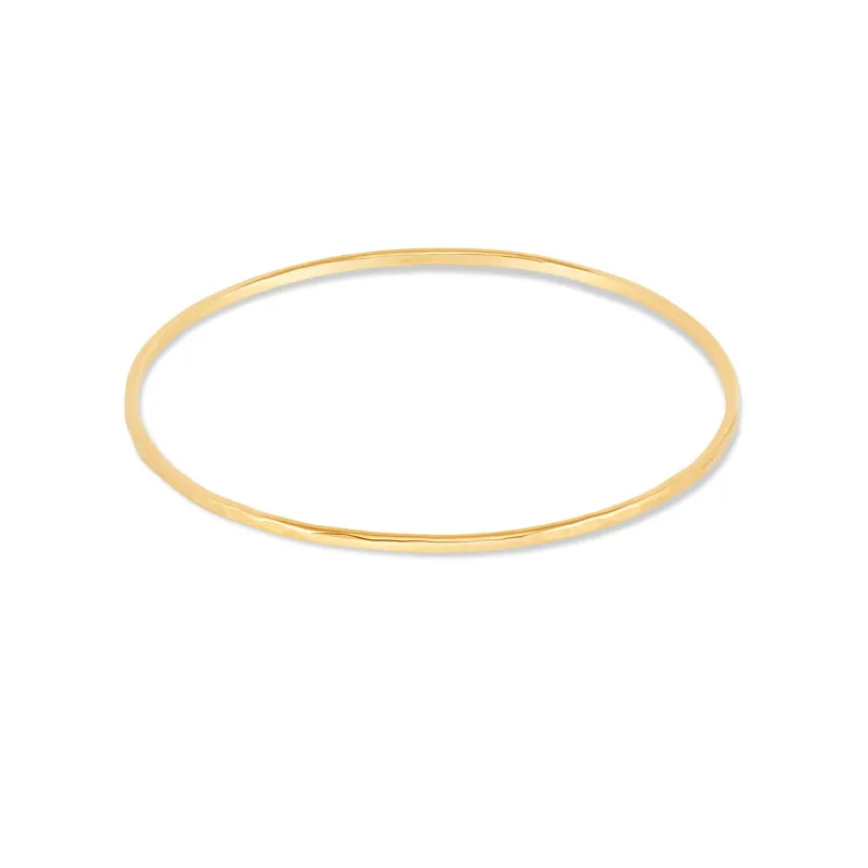 9k Gold 2mm Hammered Nomad Bangle sold by Dower & Hall