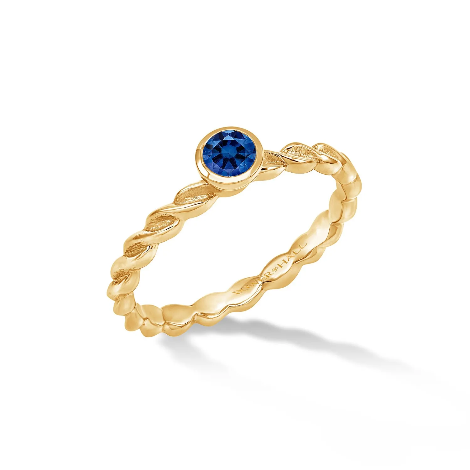 14k Twist Narrative Ring with 4mm Blue Sapphire sold by Dower & Hall
