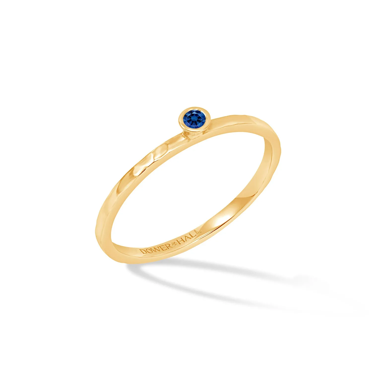 14k Hammered Narrative Ring with 2mm Blue Sapphire sold by Dower & Hall