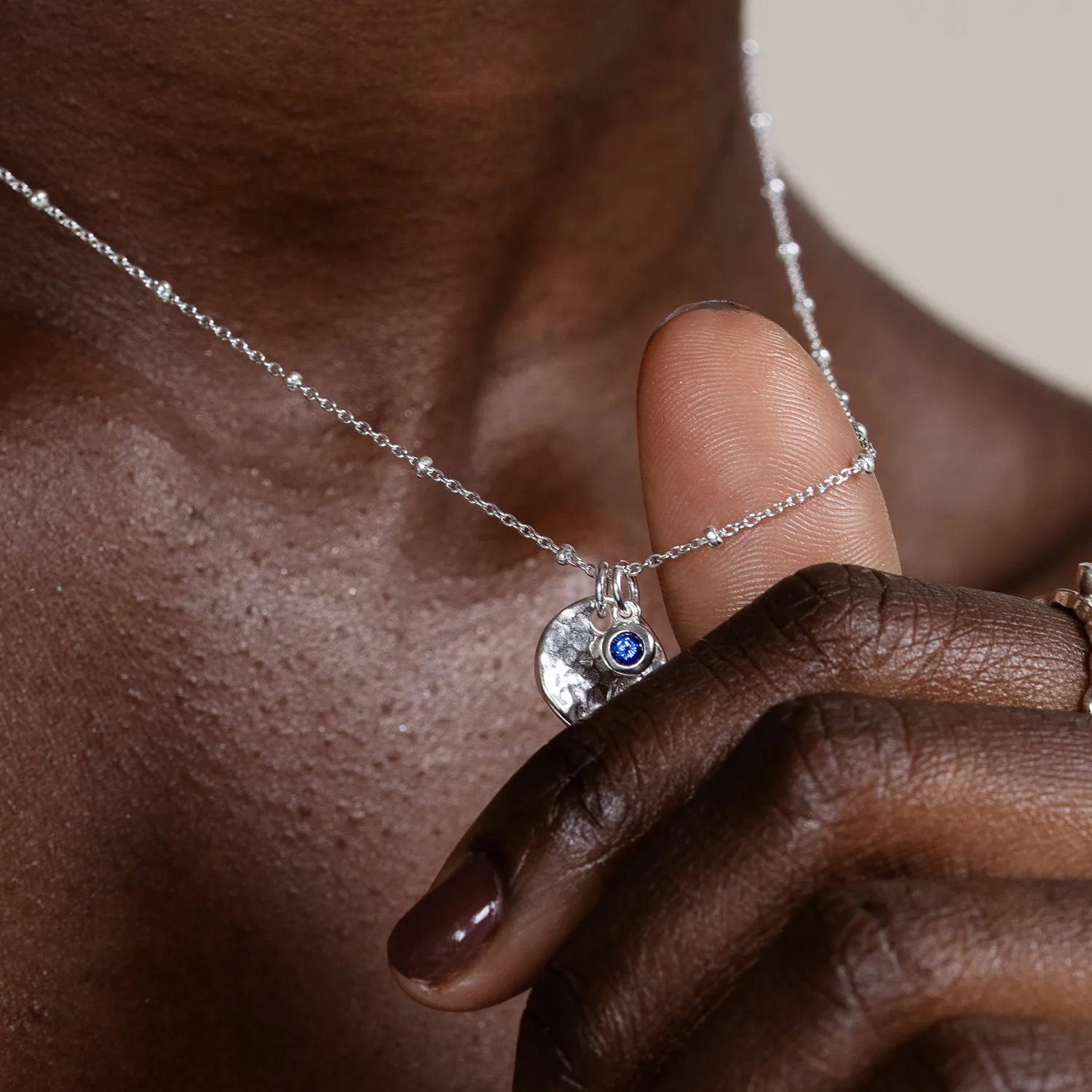 Hammered Disc & Blue Sapphire Array Necklace sold by Dower & Hall product image thumbnail 2