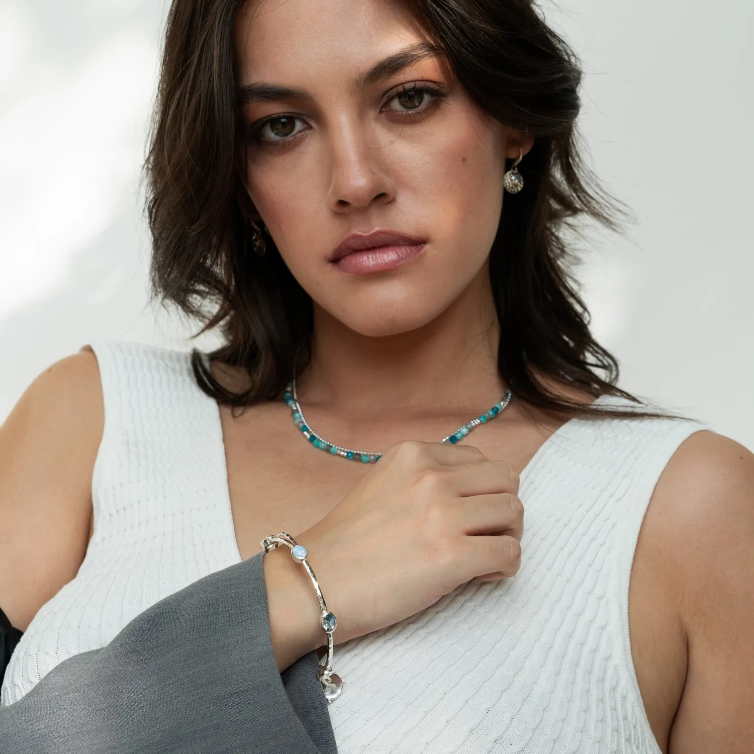 Oval Opal & Topaz Array Bangle sold by Dower & Hall product image thumbnail 2