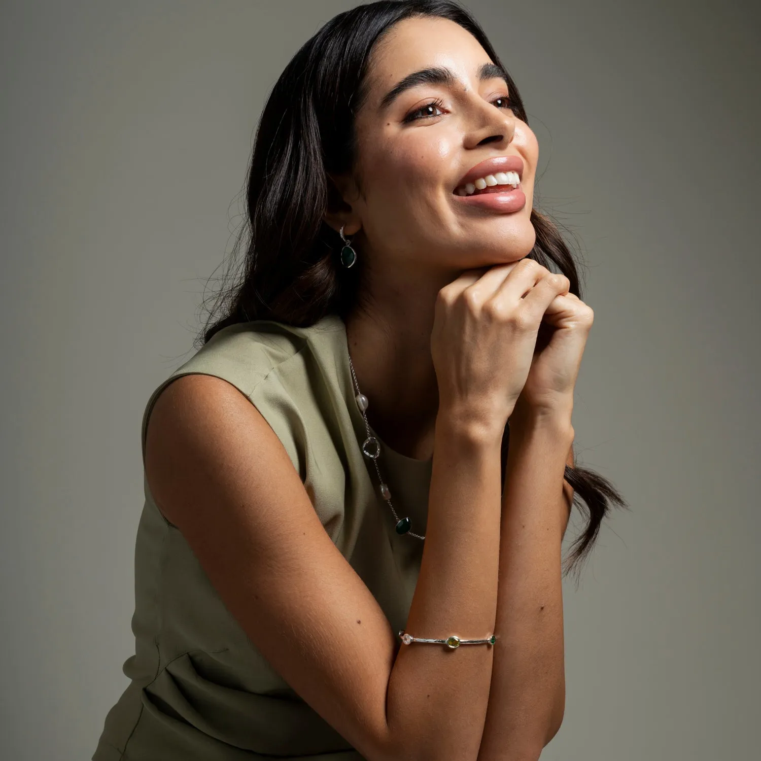 Oval Green Garnet, Peridot & Topaz Array Bangle sold by Dower & Hall product image thumbnail 3