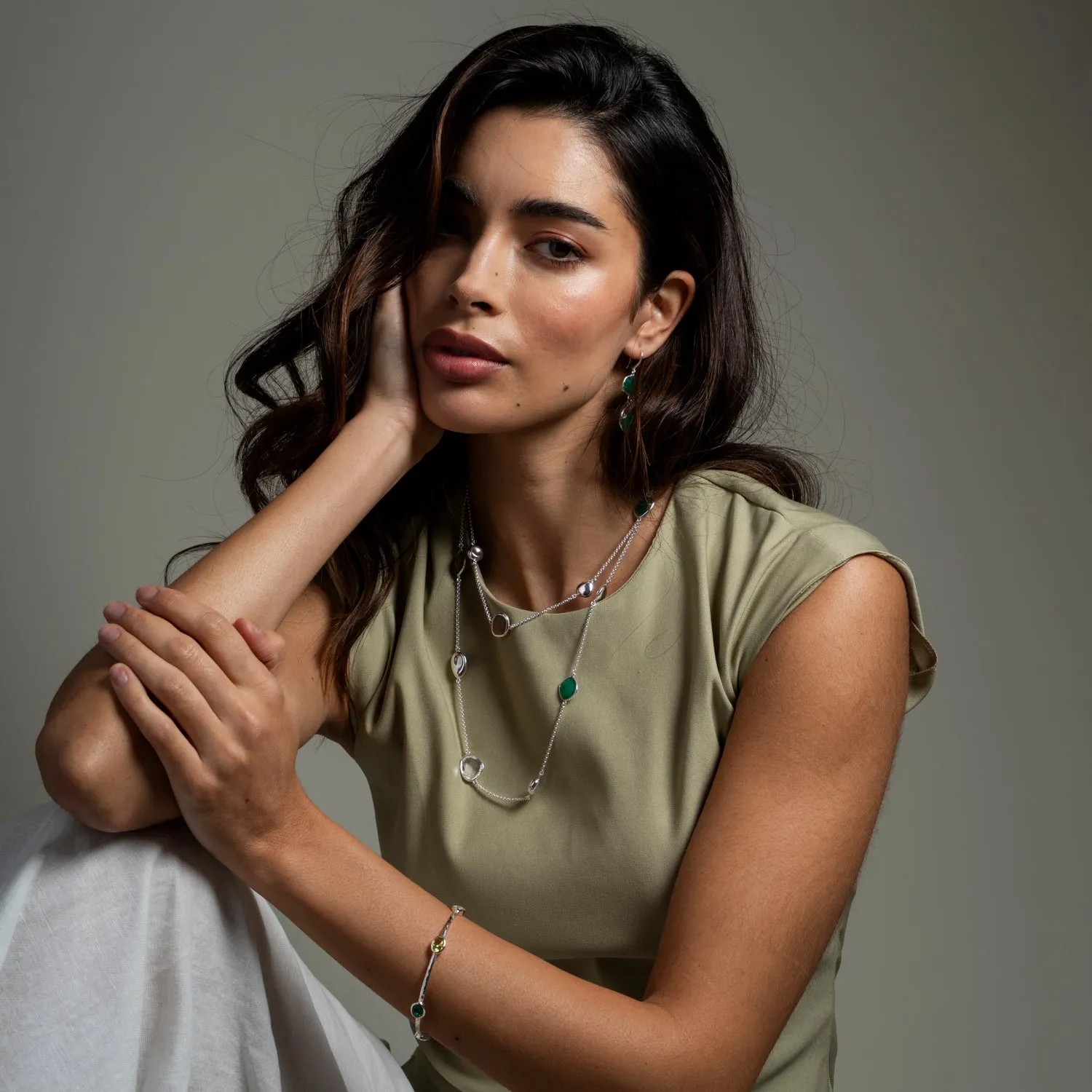 Oval Green Garnet, Peridot & Topaz Array Bangle sold by Dower & Hall product image thumbnail 4