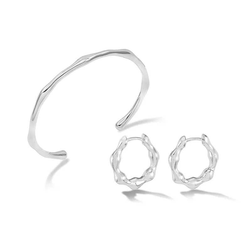 Waterfall Hinged Huggie Hoops and Bangle Set sold by Dower & Hall