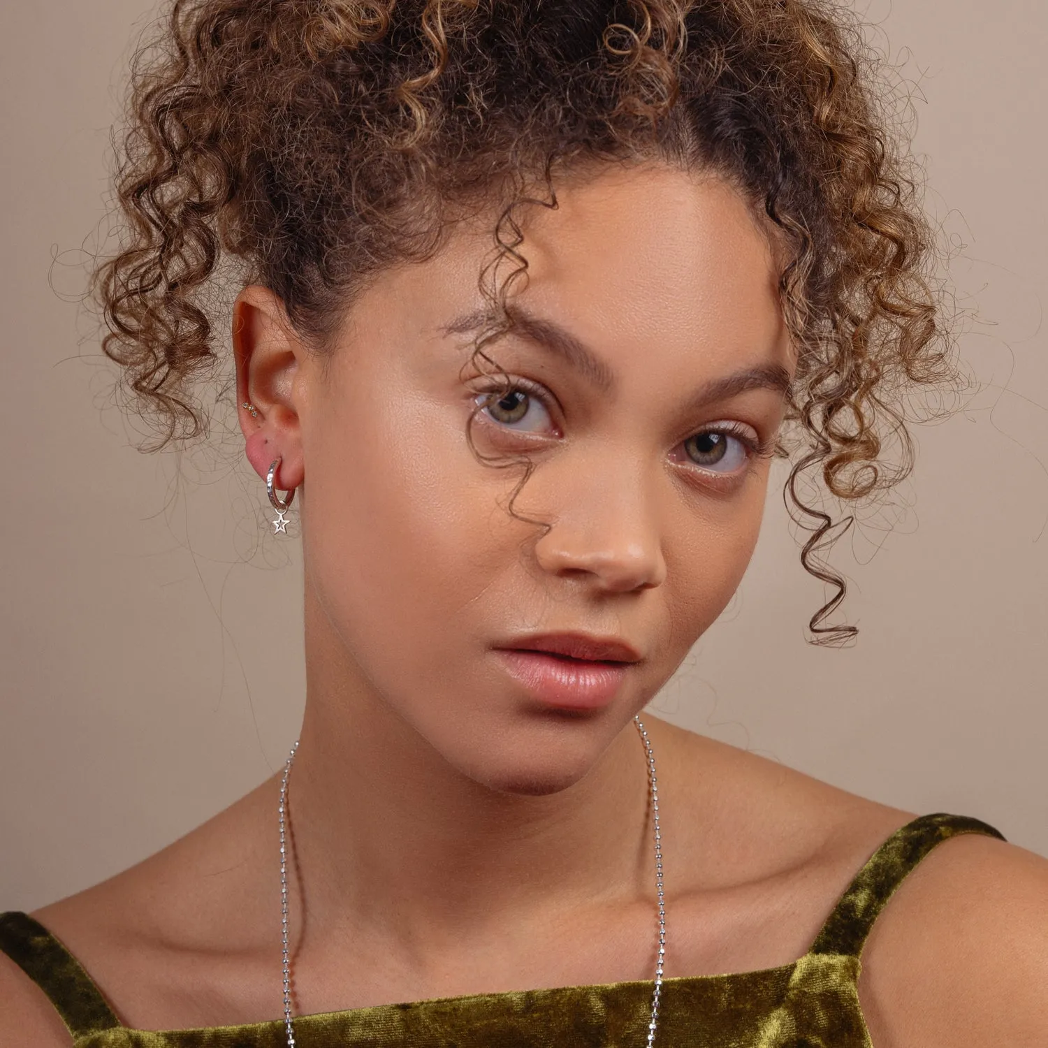 Hammered Star Charm Huggie Hoops sold by Dower & Hall product image thumbnail 3