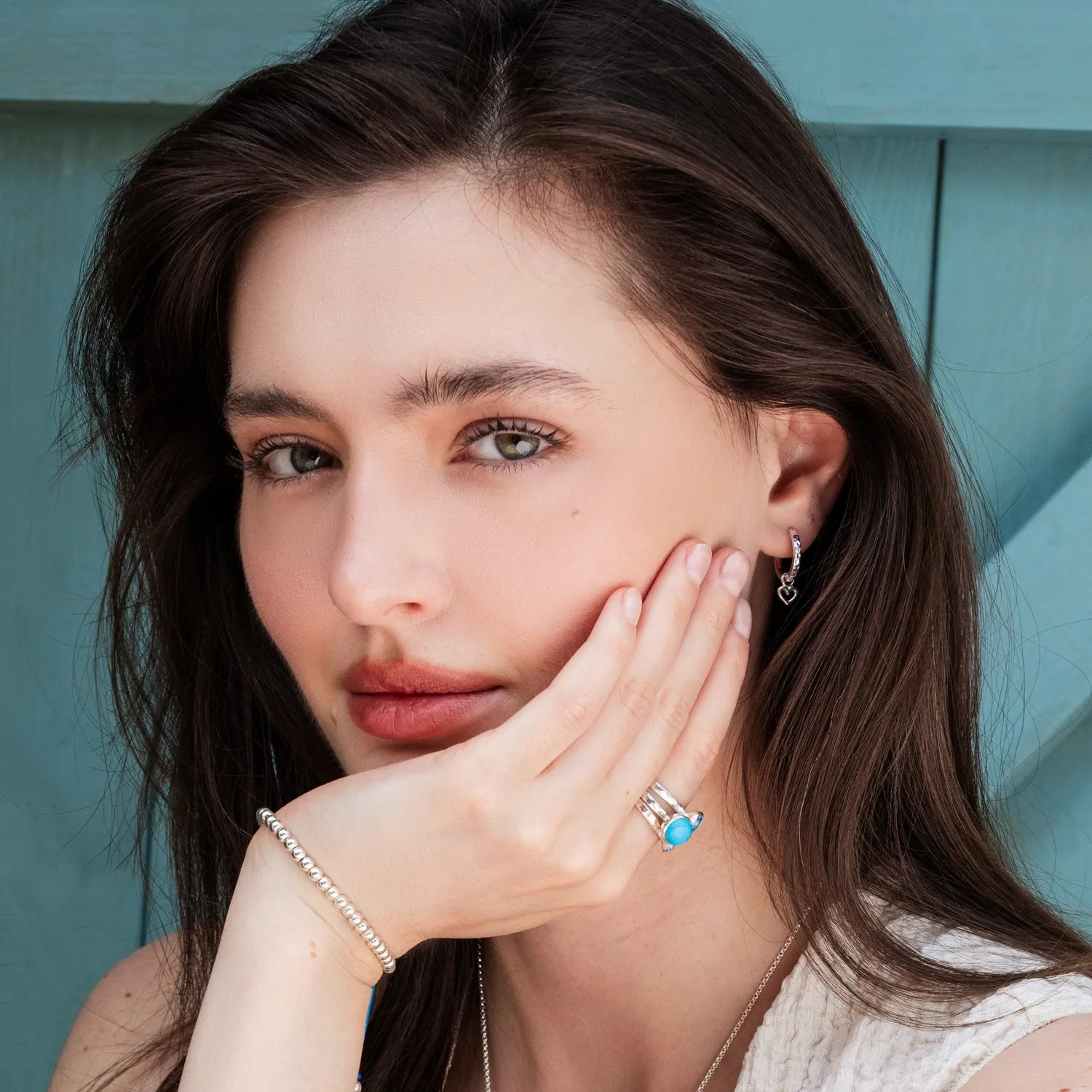 Hammered Heart Charm Huggie Hoops sold by Dower & Hall product image thumbnail 5