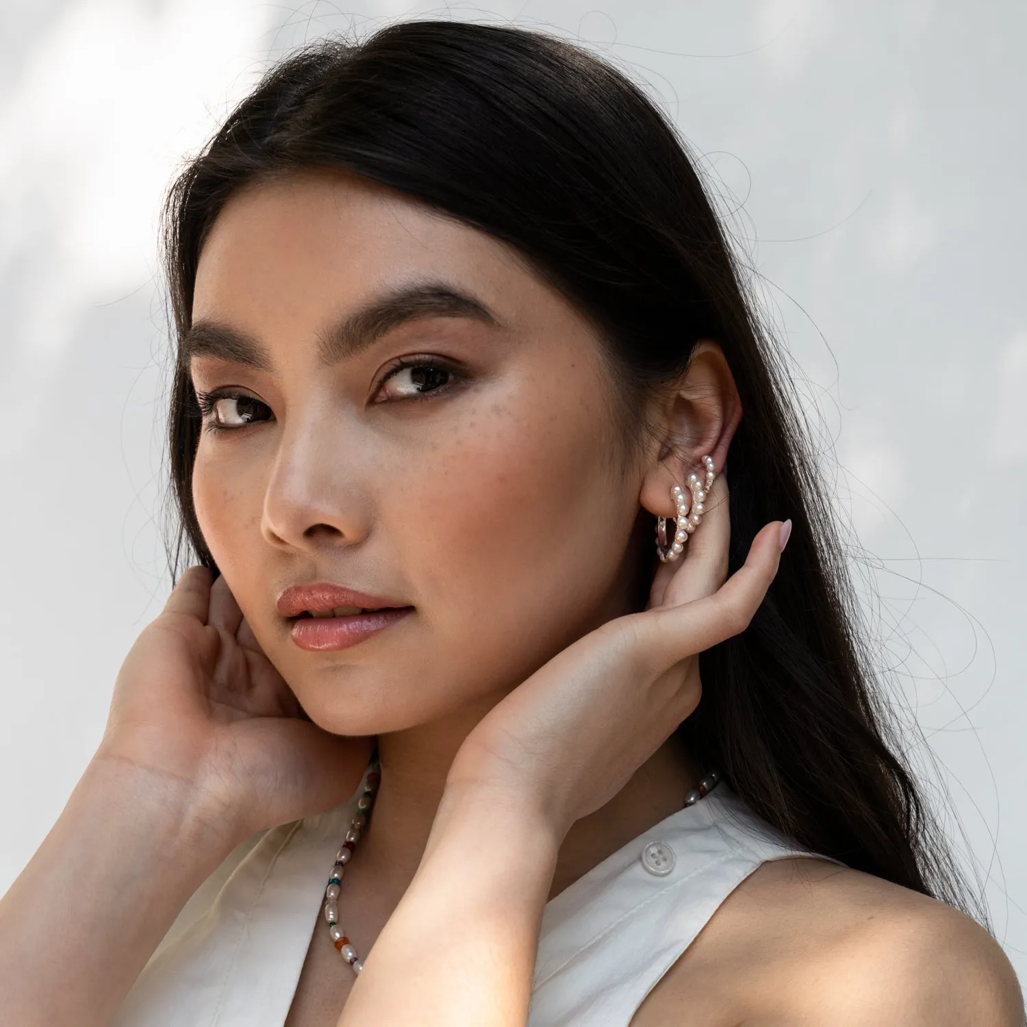 Large Timeless Pearl Huggie Hoops sold by Dower & Hall product image thumbnail 4