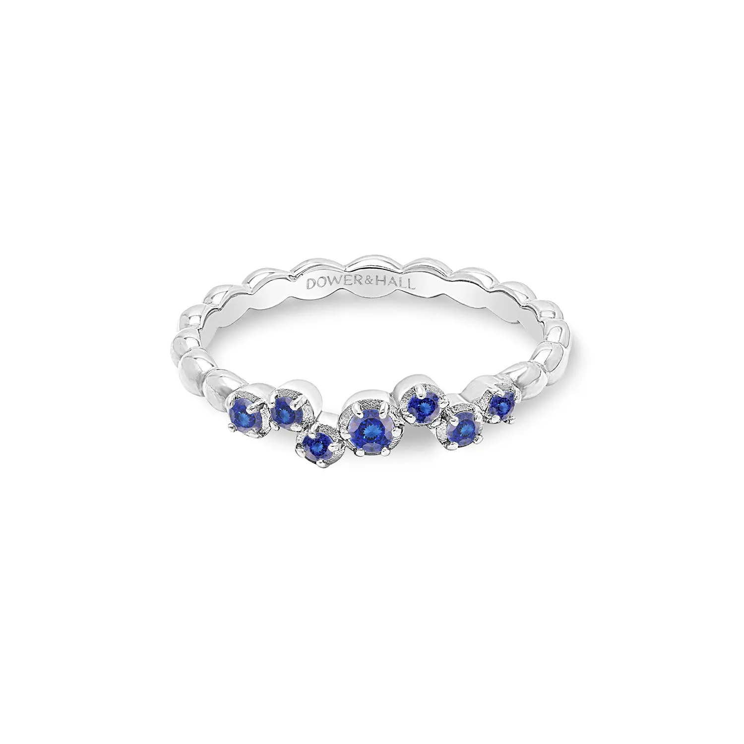 14k Stargazer Narrative Ring with Blue Sapphire sold by Dower & Hall