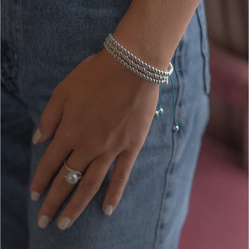 Blue Misanga Cord Bracelet sold by Dower & Hall product image thumbnail 2
