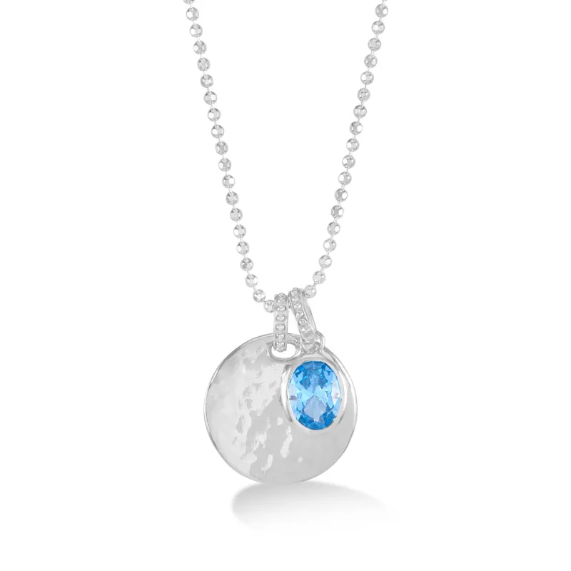 Hammered Disc & Oval Blue Topaz Array Pendant sold by Dower & Hall