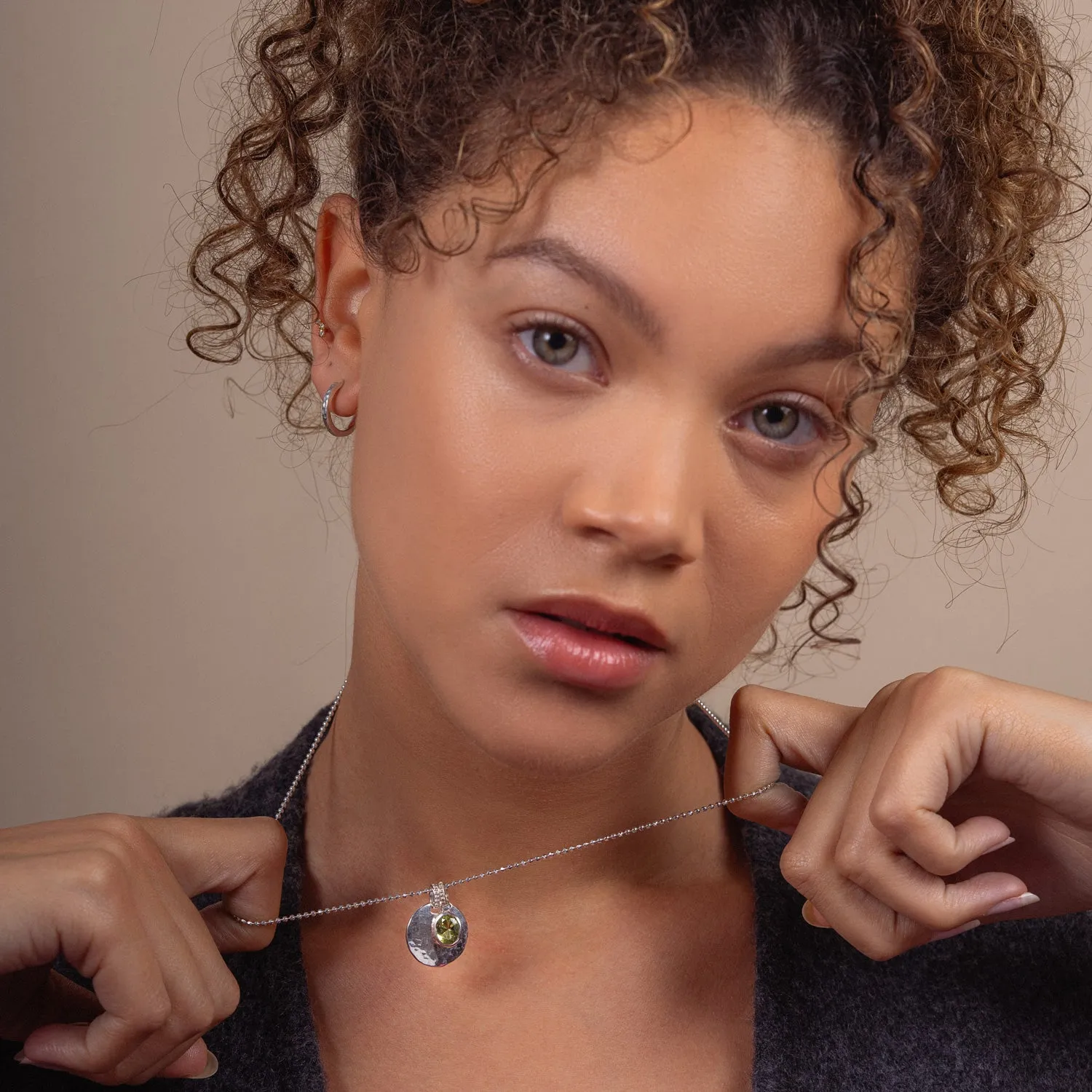 Hammered Disc & Oval Peridot Array Pendant sold by Dower & Hall product image thumbnail 2