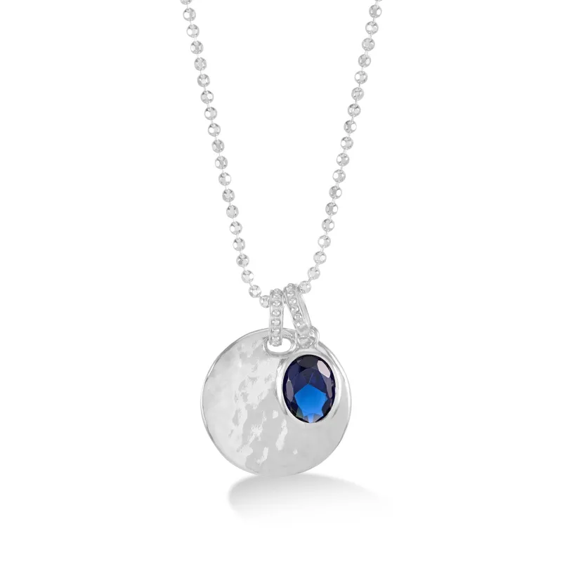 Hammered Disc & Oval Blue Spinel Array Pendant sold by Dower & Hall