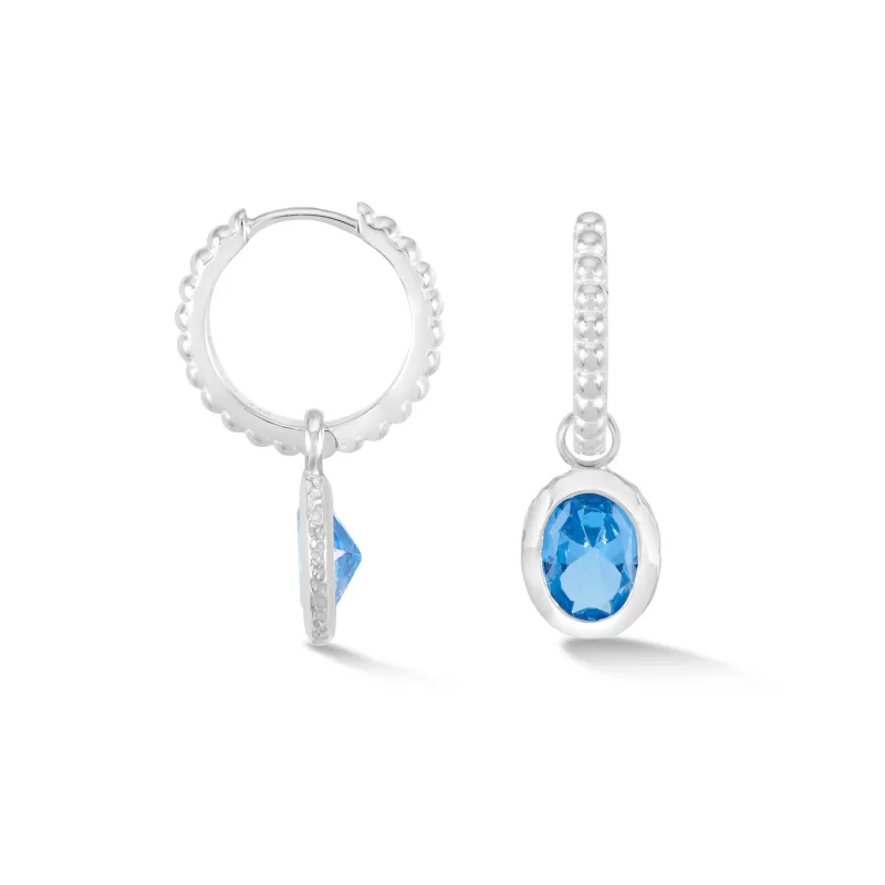 Oval Blue Topaz Array Hoops sold by Dower & Hall